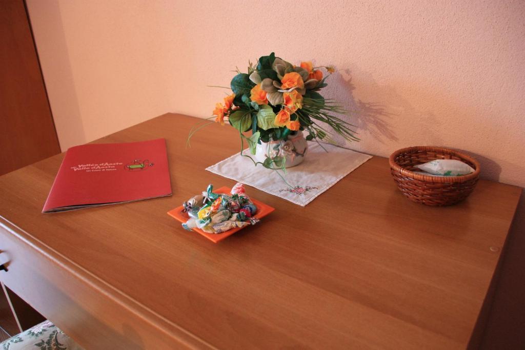 Hotel Bellevue Gignod Pokoj fotografie