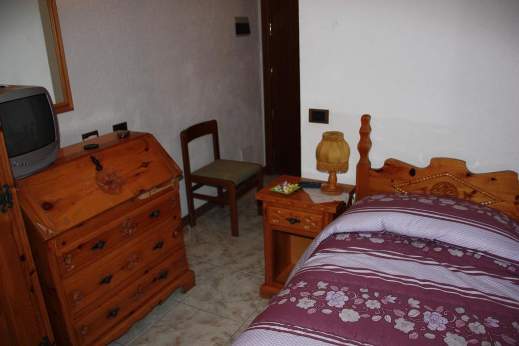 Hotel Bellevue Gignod Pokoj fotografie