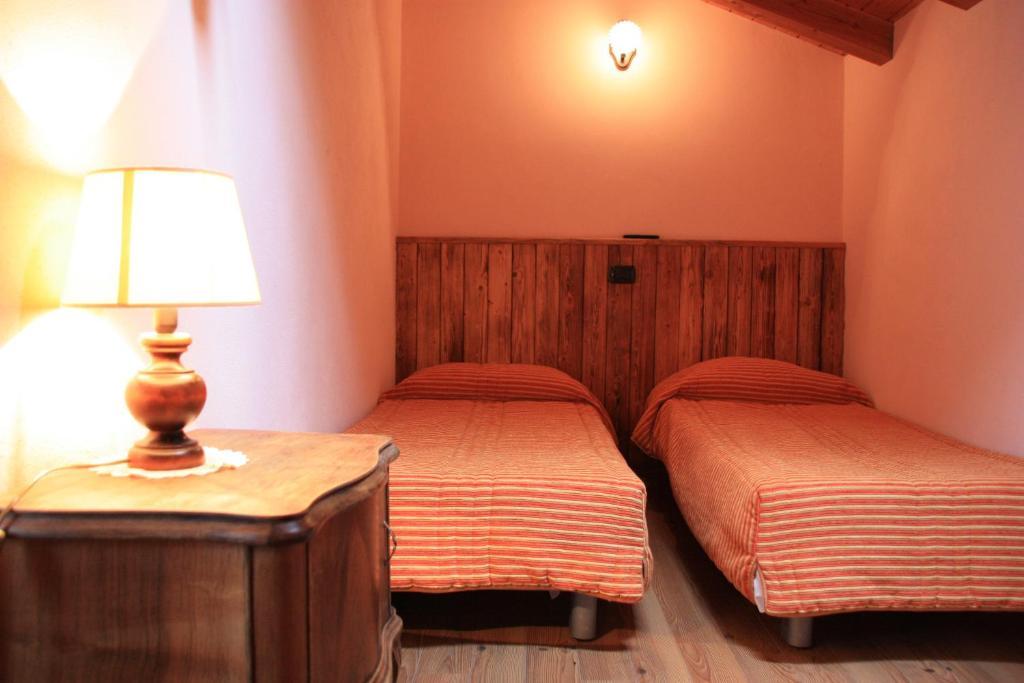 Hotel Bellevue Gignod Pokoj fotografie
