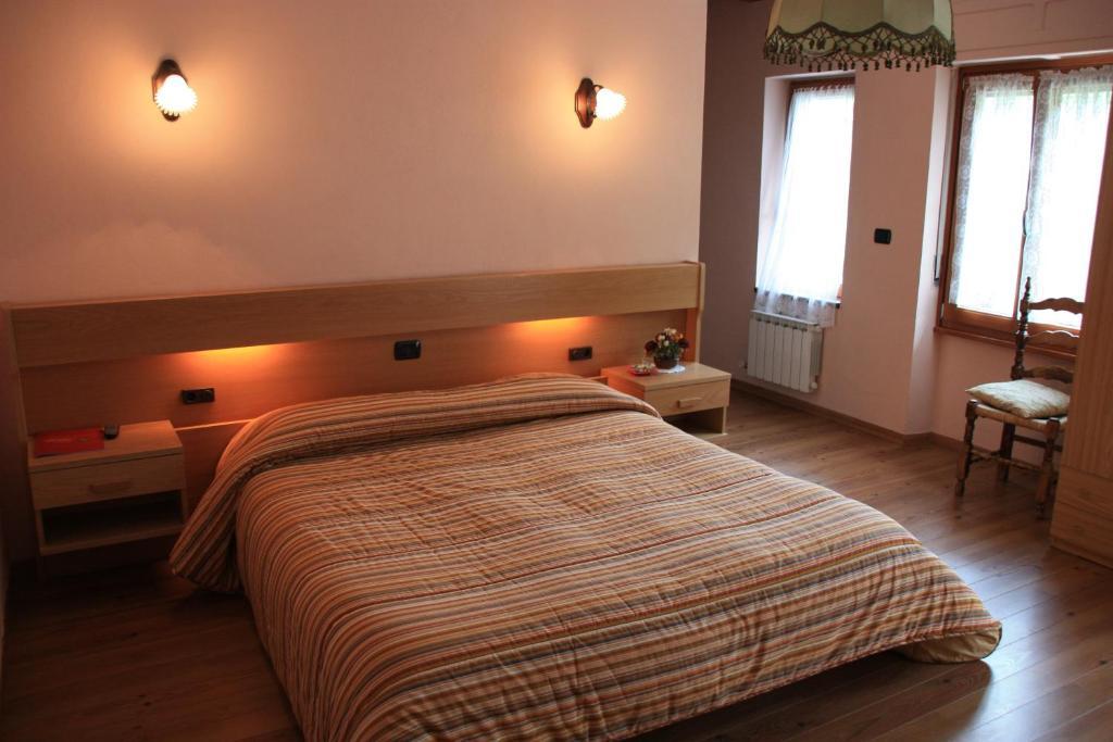 Hotel Bellevue Gignod Pokoj fotografie