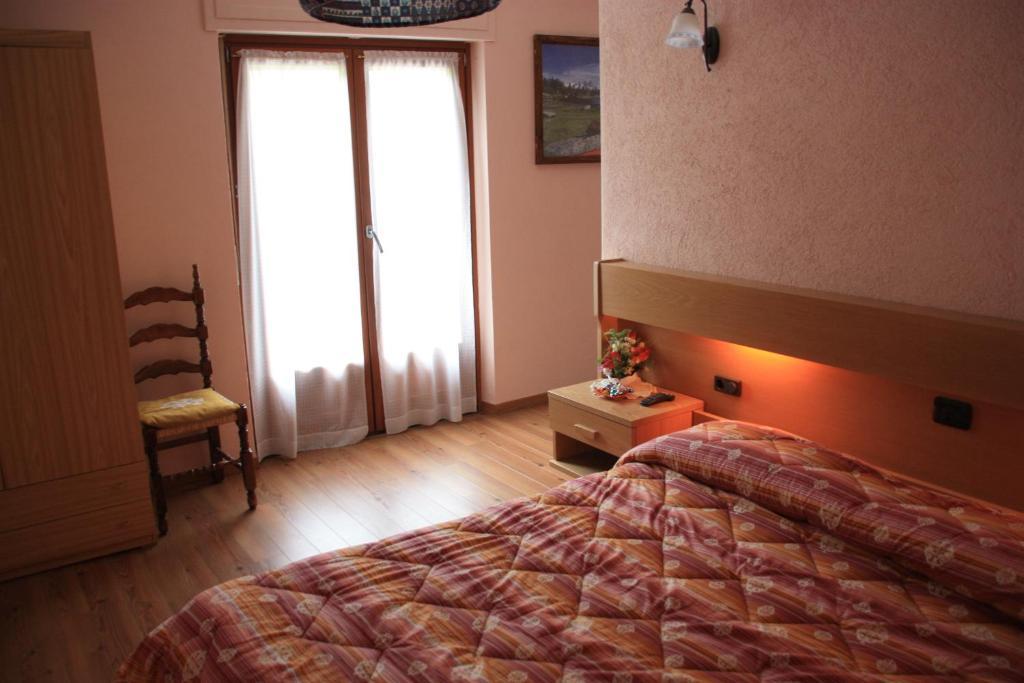 Hotel Bellevue Gignod Pokoj fotografie